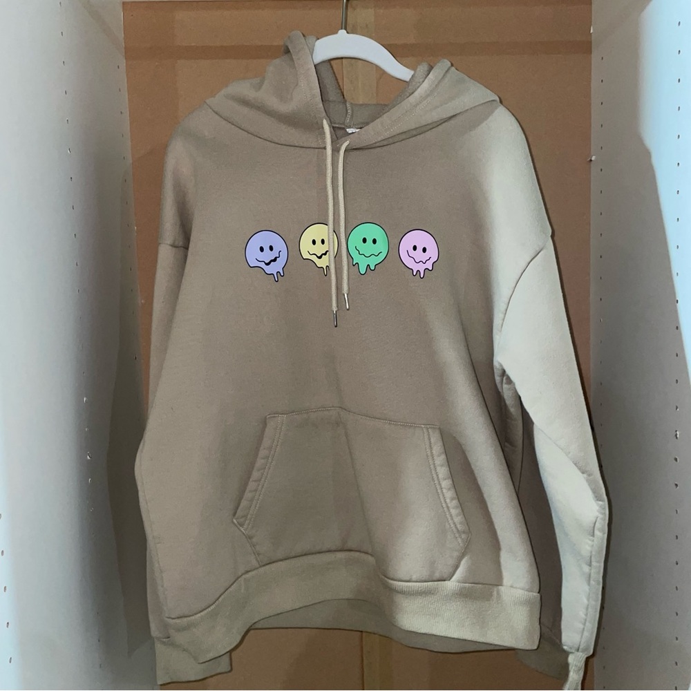 Beige Hoodie with Pastel Melting Smiley Faces